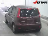 2009 Nissan Note 15X FOUR 4WD Red Van for sale, Japanese used car export - photo 2 of 3 | GULJI TRADERS