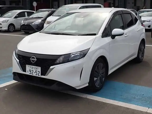 2023 Nissan Note X - photo 1 2023 Nissan Note X Pearl Van for sale, Japanese used car export - photo 1 of 9 | GULJI TRADERS