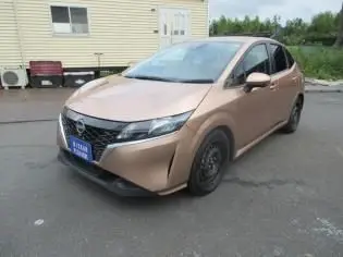 2023 Nissan Note X - photo 1 2023 Nissan Note X Brown Van for sale, Japanese used car export - photo 1 of 8 | GULJI TRADERS