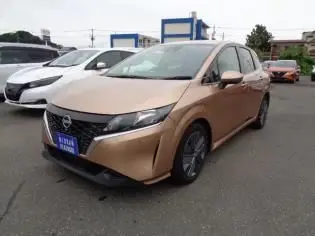 2023 Nissan Note X - photo 1 2023 Nissan Note X Gold Van for sale, Japanese used car export - photo 1 of 8 | GULJI TRADERS