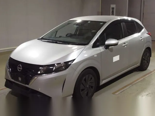 2022 Nissan Note Push Start S Grade - photo 1 2022 Nissan Note Push Start S Grade Silver Van for sale, Japanese used car export | GULJI TRADERS