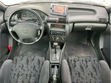 1994 Opel Astra Cabrio Black Sedan for sale, Japanese used car export - photo 18 of 49 | GULJI TRADERS