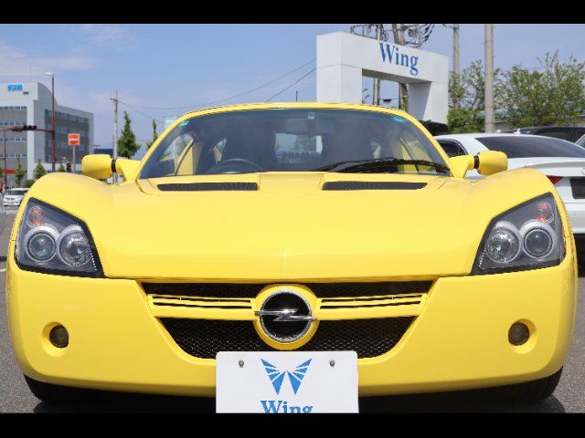 2003 Opel Speedster < Base > Yellow Sedan for sale, Japanese used car export - photo 1 of 24 | GULJI TRADERS