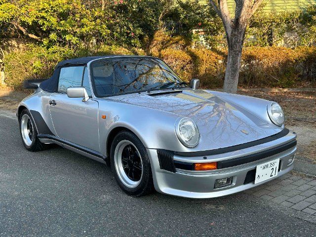 1988 Porsche 911 911 Turbo Cabriolet - photo 1 1988 Porsche 911 911 Turbo Cabriolet Silver Coupe for sale, Japanese used car export - photo 1 of 24 | GULJI TRADERS