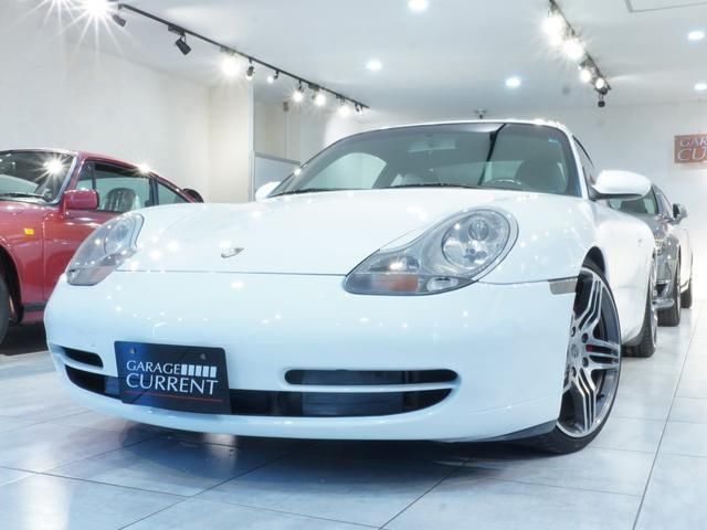 1998 Porsche 911 - photo 1 1998 Porsche 911 White Coupe for sale, Japanese used car export - photo 1 of 9 | GULJI TRADERS