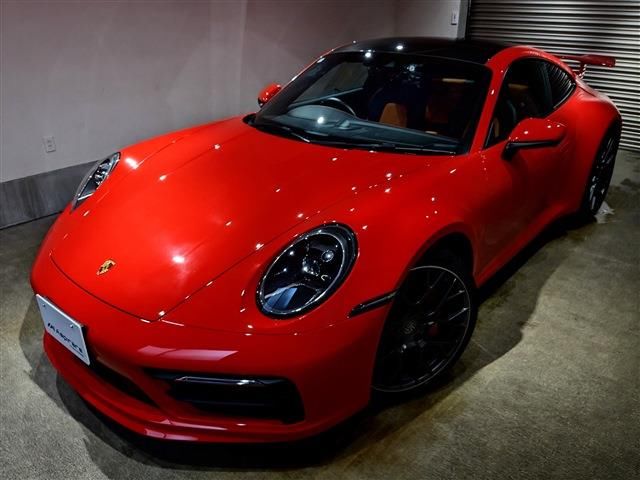 2020 Porsche 911 Carrera S Aero Kit Spoiler Exhaust - photo 1 2020 Porsche 911 Carrera S Aero Kit Spoiler Exhaust Orange Coupe for sale, Japanese used car export - photo 1 of 15 | GULJI TRADERS