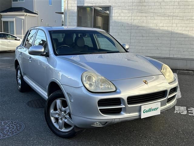 2005 Porsche Cayenne 4WD - photo 1 2005 Porsche Cayenne 4WD SUV for sale, Japanese used car export - photo 1 of 24 | GULJI TRADERS