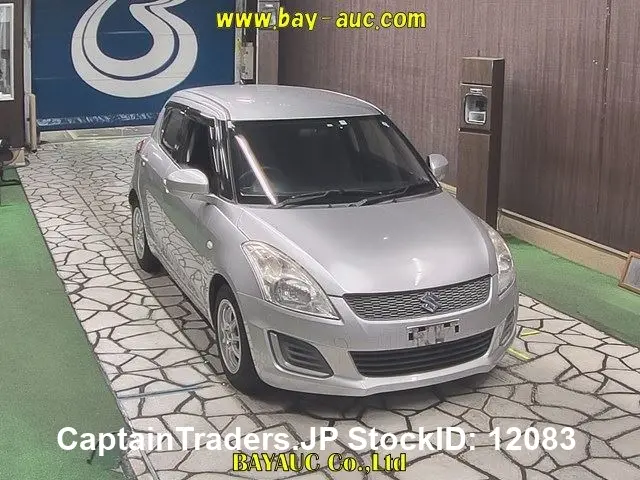 2015 Suzuki Swift - photo 1 2015 Suzuki Swift Silver Sedan for sale, Japanese used car export | GULJI TRADERS
