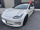 2019 Tesla Model 3 Performance lowering Brown Sedan for sale, Japanese used car export - photo 9 of 12 | GULJI TRADERS