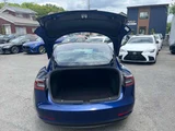 2021 Tesla Model 3 Standard Range Plus Blue Sedan for sale, Japanese used car export - photo 37 of 75 | GULJI TRADERS