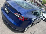 2021 Tesla Model 3 Standard Range Plus Blue Sedan for sale, Japanese used car export - photo 67 of 75 | GULJI TRADERS