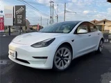 2021 Tesla Model 3 Long-range 4WD White Sedan for sale, Japanese used car export - photo 1 of 18 | GULJI TRADERS