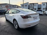 2021 Tesla Model 3 Long-range 4WD White Sedan for sale, Japanese used car export - photo 6 of 18 | GULJI TRADERS