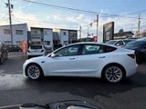 2021 Tesla Model 3 Long-range 4WD White Sedan for sale, Japanese used car export - photo 7 of 18 | GULJI TRADERS
