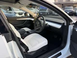 2021 Tesla Model 3 Long-range 4WD White Sedan for sale, Japanese used car export - photo 9 of 18 | GULJI TRADERS