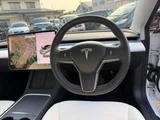 2021 Tesla Model 3 Long-range 4WD White Sedan for sale, Japanese used car export - photo 11 of 18 | GULJI TRADERS