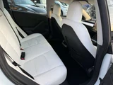 2021 Tesla Model 3 Long-range 4WD White Sedan for sale, Japanese used car export - photo 12 of 18 | GULJI TRADERS
