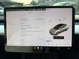 2021 Tesla Model 3 Long-range 4WD White Sedan for sale, Japanese used car export - photo 14 of 18 | GULJI TRADERS