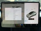 2021 Tesla Model 3 Long-range 4WD White Sedan for sale, Japanese used car export - photo 15 of 18 | GULJI TRADERS