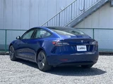 2021 Tesla Model 3 STANDARD PLUS Blue Sedan for sale, Japanese used car export - photo 7 of 30 | GULJI TRADERS
