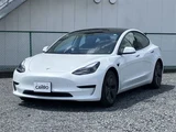 2021 Tesla Model 3 STANDARD RANGE + White Sedan for sale, Japanese used car export - photo 1 of 30 | GULJI TRADERS
