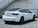 2021 Tesla Model 3 STANDARD RANGE + White Sedan for sale, Japanese used car export - photo 5 of 30 | GULJI TRADERS