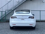 2021 Tesla Model 3 STANDARD RANGE + White Sedan for sale, Japanese used car export - photo 6 of 30 | GULJI TRADERS