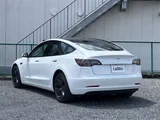 2021 Tesla Model 3 STANDARD RANGE + White Sedan for sale, Japanese used car export - photo 7 of 30 | GULJI TRADERS