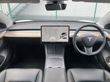2021 Tesla Model 3 STANDARD RANGE + White Sedan for sale, Japanese used car export - photo 10 of 30 | GULJI TRADERS