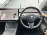 2021 Tesla Model 3 STANDARD RANGE + White Sedan for sale, Japanese used car export - photo 11 of 30 | GULJI TRADERS