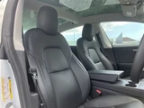 2021 Tesla Model 3 STANDARD RANGE + White Sedan for sale, Japanese used car export - photo 12 of 30 | GULJI TRADERS