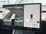 2021 Tesla Model 3 STANDARD RANGE + White Sedan for sale, Japanese used car export - photo 16 of 30 | GULJI TRADERS