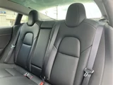 2021 Tesla Model 3 STANDARD RANGE + White Sedan for sale, Japanese used car export - photo 24 of 30 | GULJI TRADERS