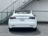 2021 Tesla Model 3 STANDARD RANGE + White Sedan for sale, Japanese used car export - photo 6 of 30 | GULJI TRADERS