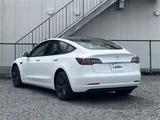 2021 Tesla Model 3 STANDARD RANGE + White Sedan for sale, Japanese used car export - photo 7 of 30 | GULJI TRADERS