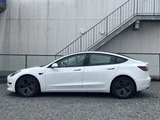 2021 Tesla Model 3 STANDARD RANGE + White Sedan for sale, Japanese used car export - photo 9 of 30 | GULJI TRADERS