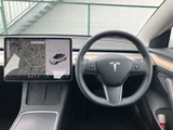 2021 Tesla Model 3 STANDARD RANGE + White Sedan for sale, Japanese used car export - photo 17 of 30 | GULJI TRADERS
