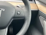 2021 Tesla Model 3 STANDARD RANGE + White Sedan for sale, Japanese used car export - photo 20 of 30 | GULJI TRADERS