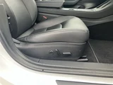 2021 Tesla Model 3 STANDARD RANGE + White Sedan for sale, Japanese used car export - photo 24 of 30 | GULJI TRADERS