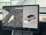 2021 Tesla Model 3 STANDARD RANGE + White Sedan for sale, Japanese used car export - photo 25 of 30 | GULJI TRADERS