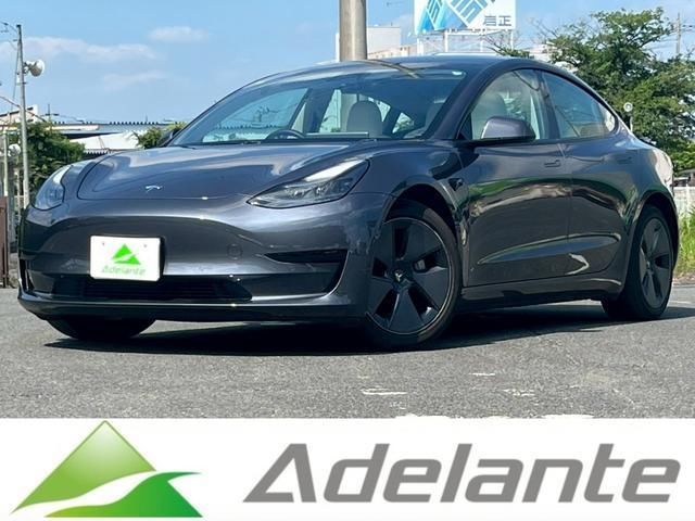 2021 Tesla Model 3 Standard Plus - photo 1 2021 Tesla Model 3 Standard Plus Gray Sedan for sale, Japanese used car export - photo 1 of 9 | GULJI TRADERS