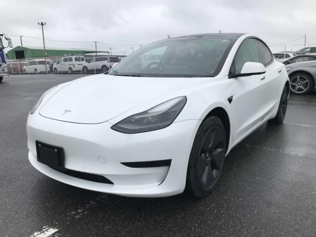 2021 Tesla Model 3 Standard Plus White Sedan for sale, Japanese used car export - photo 1 of 9 | GULJI TRADERS