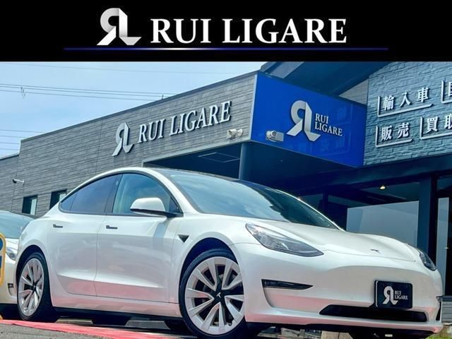 2021 Tesla Model 3 Long range - photo 1 2021 Tesla Model 3 Long range Pearl Sedan for sale, Japanese used car export - photo 1 of 9 | GULJI TRADERS