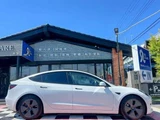 2021 Tesla Model 3 Standard Range Plus Pearl Sedan for sale, Japanese used car export - photo 7 of 9 | GULJI TRADERS