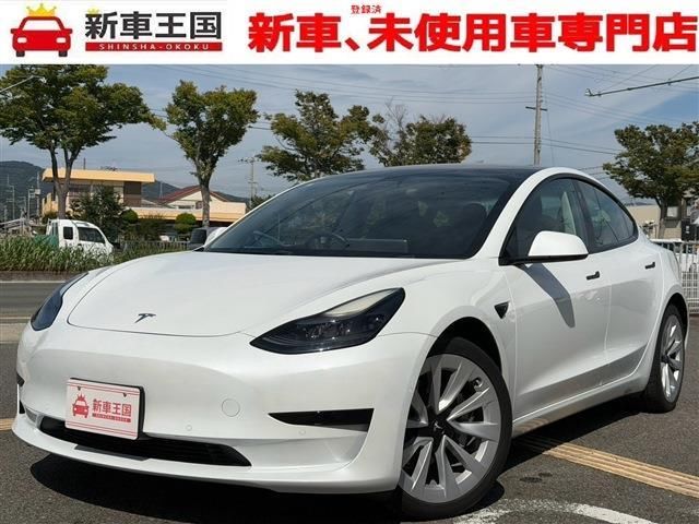 2021 Tesla Model 3 Standard Range Plus - photo 1 2021 Tesla Model 3 Standard Range Plus Pearl Sedan for sale, Japanese used car export - photo 1 of 9 | GULJI TRADERS