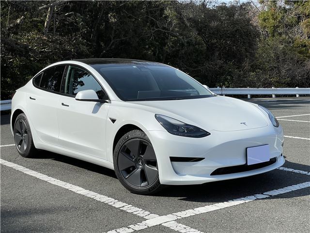 2022 Tesla Model 3 RWD - photo 1 2022 Tesla Model 3 RWD White Sedan for sale, Japanese used car export - photo 1 of 21 | GULJI TRADERS