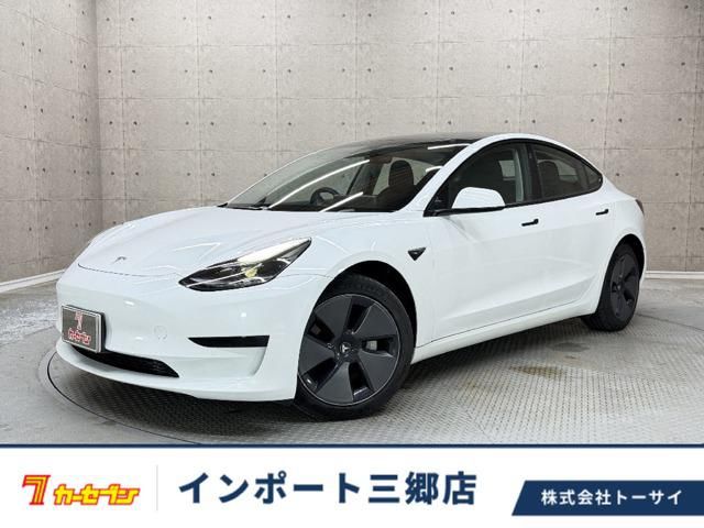 2022 Tesla Model 3 RWD - photo 1 2022 Tesla Model 3 RWD Pearl Sedan for sale, Japanese used car export | GULJI TRADERS