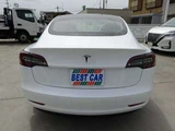 2023 Tesla Model 3 Base grade White Sedan for sale, Japanese used car export - photo 4 of 52 | GULJI TRADERS