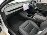 2023 Tesla Model 3 Long Range 4WD White Sedan for sale, Japanese used car export - photo 26 of 50 | GULJI TRADERS