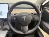 2023 Tesla Model 3 Dual Motor AWD Long Range White Sedan for sale, Japanese used car export - photo 7 of 9 | GULJI TRADERS